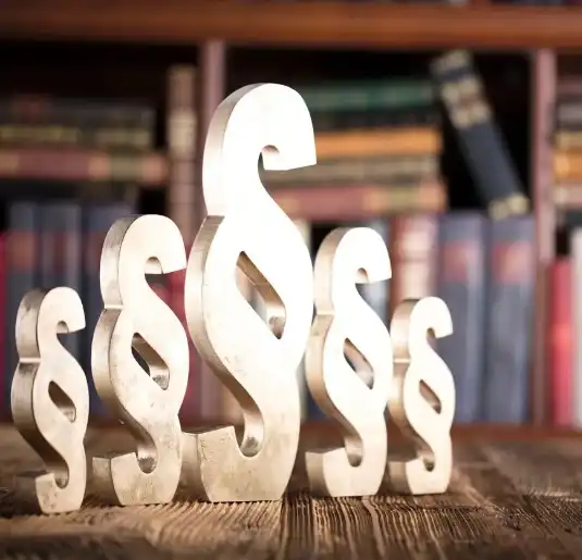 A wooden table with some dollar signs on it